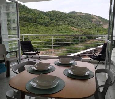 Girardot Apartment | Mountain View Apartment: Pet-Friendly with Pool & Oceanfront