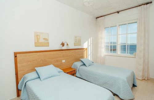 Muros Apartment | Exceptional Oceanfront Living at Apartamentos Ancoradoiro