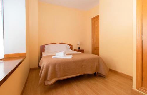 Canfranc-Estacion Apartment | Cozy Apartamentos Canfranc 3000: Pet & Child Friendly Stay
