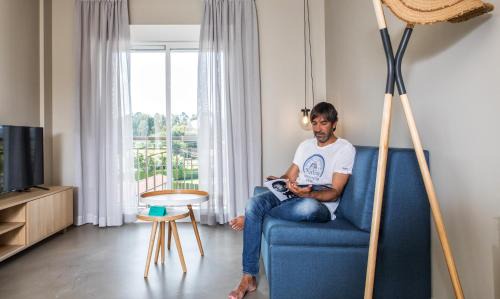 Coiron Hotel | Enjoy Comfort at Apartamentos Dena with Pool & Hot Tub