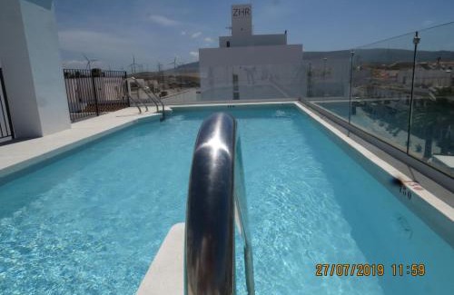 Zahara de los Atunes Apartment | Oceanfront Apartamentos Cachón with Pool and Family Comfort