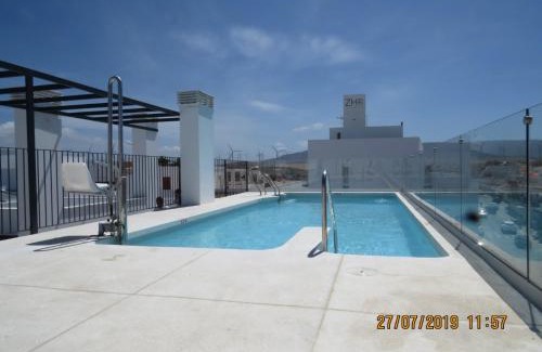 Zahara de los Atunes Apartment | Oceanfront Apartamentos Cachón with Pool and Family Comfort