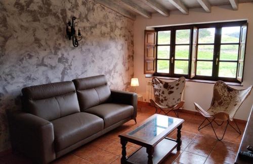 Orena Apartment | Oceanfront Retreat: Apartamentos la Roblera, Rated 9.5/10