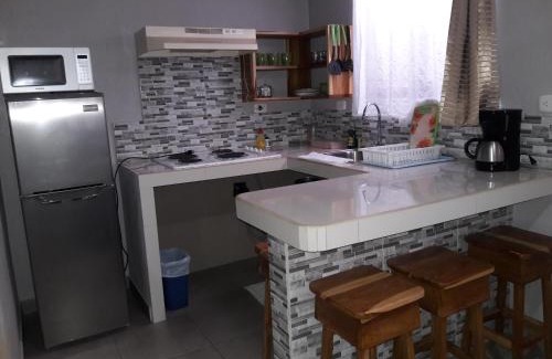 Quepos Hotel | Budget-Friendly Stay at Apartamentos Mansión Tropical