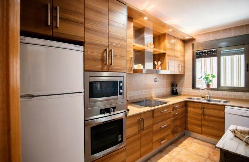 Calaceite House | Family-Friendly Getaway at Apartamentos Maribel with Pool