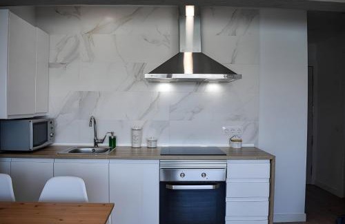 Mogro Apartment | Oceanfront Apartamentos Playa de Mogro with Pet-Friendly Perks