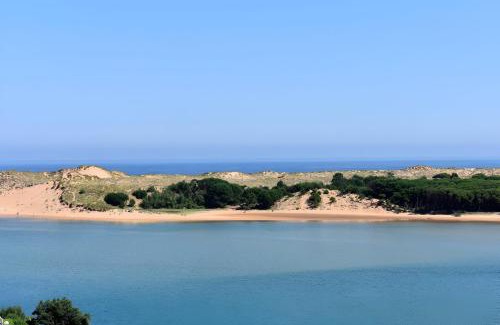 Mogro Apartment | Oceanfront Apartamentos Playa de Mogro with Pet-Friendly Perks