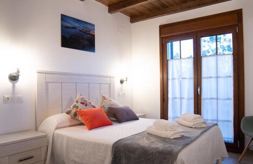 La Caridad Apartment | Exceptional Apartamentos Rurales Camín Real: Pet Friendly Stay