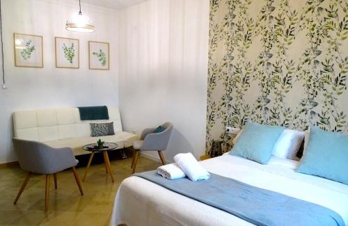 Genil Apartment | Relax at Apartamentos Serrallo with Oceanfront Pool Access