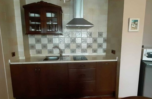 Madrona Hotel | Elegant El Nogal Apartments: Rated 9.6, Family-Friendly Stays
