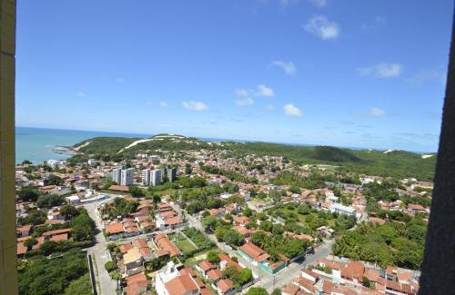 Ponta Negra Apartment | Indulge at Apartamentos Verano with Ocean Views & Pool