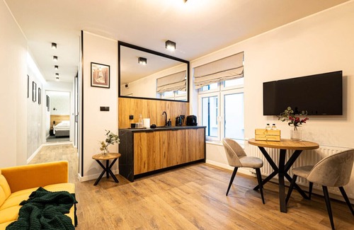 Stare Miasto Apartment | Discover Garbary 12: Family-Friendly Apartment Awaits