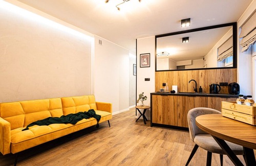 Stare Miasto Apartment | Discover Garbary 12: Family-Friendly Apartment Awaits
