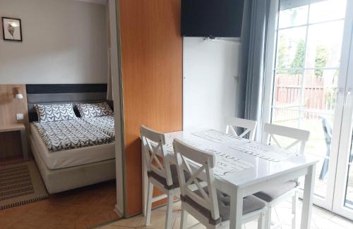 Poddabie Apartment | Cozy Apartamenty Poddąbie with Garden & Ocean View