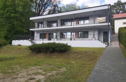 Dlugie Apartment | Relaxing Lakefront Apartments with Family and Pet Friendly Amenities