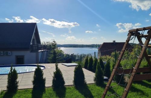 Faszcze Apartment | Top-Rated Apartamenty Zełwągi 15 with Pool & Family Appeal