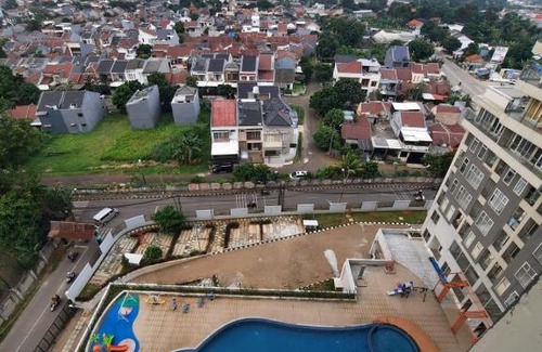 Serpong Apartment | Exceptional Amazana Apartment with Pool & Child-Friendly Perks