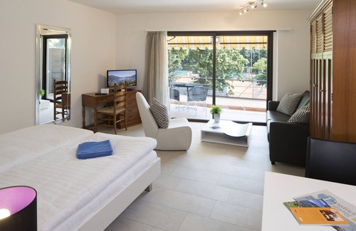 Locarno Hotel | Relaxing Retreat at Aparthotel al Lago with Pool & Dining
