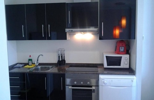 Faro de Cullera Apartment | Relax at Aparthotel El Faro with Ocean Views & Pool Access