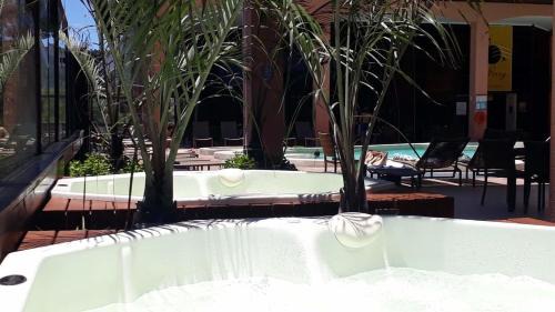 Jurere Apartment | Relax at ApartHotel no Jurerê Beach Village with Ocean Views