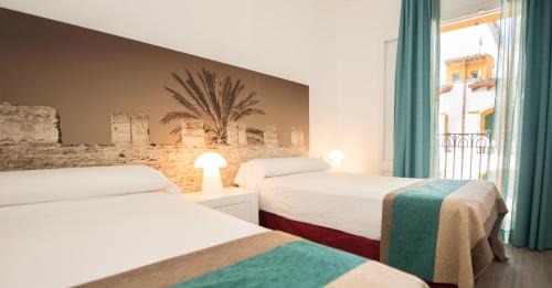 Alcanada Apartment | Experience Comfort at Aparthotel Ona Aucanada with Ocean Views