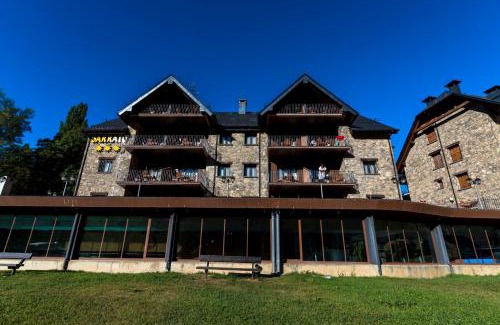 Sallent de Gallego Apartment | Discover Aparthotel Sarrato: Rated 9/10 with Private Pool