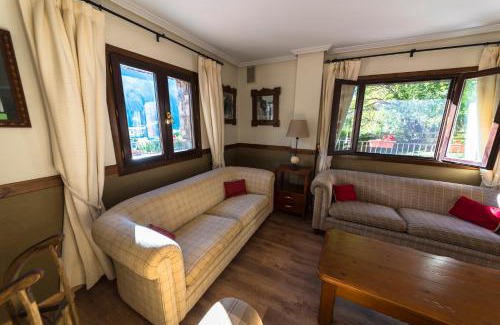 Sallent de Gallego Apartment | Discover Aparthotel Sarrato: Rated 9/10 with Private Pool