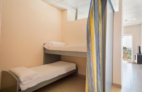 Platja d'Aro Apartment | Oceanfront Family Retreat at Aparthotel Xic - Rated 8.3/10