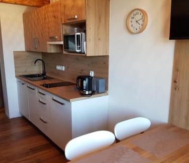 Hartmanice Apartment | Cozy Apartmán Sýkorka: Pet & Child Friendly Retreat