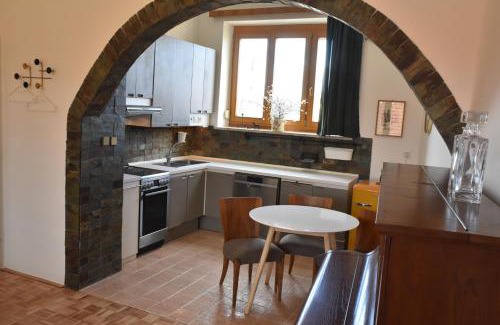 Lednice Apartment | Elegant Piano Apartment: Family-Friendly Retreat Awaits