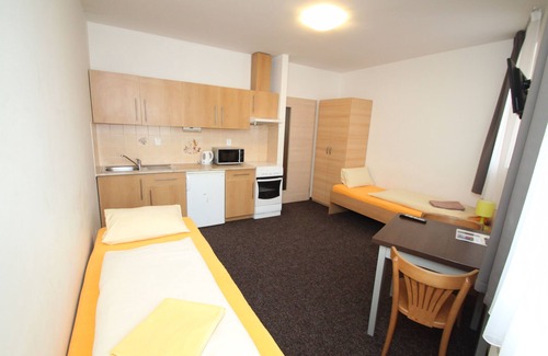 Plzen 3 Hotel | Discover Apartmány u Gigantu: Spa Retreat & Family-Friendly