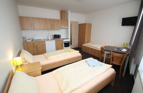 Plzen 3 Hotel | Discover Apartmány u Gigantu: Spa Retreat & Family-Friendly