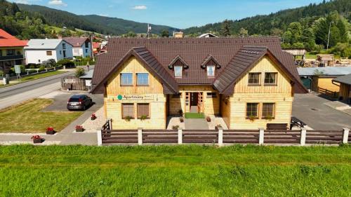 Velke Karlovice House | Relax in Apartmány Velké Karlovice with Hot Tub & Pets Welcome
