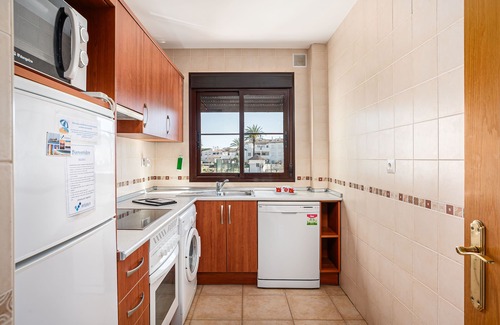 Poblado de Sancti Petri Apartment | Stunning Apartment Overlooking Pools and Gardens Near La Barrosa