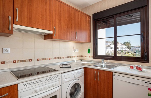 Poblado de Sancti Petri Apartment | Stunning Apartment Overlooking Pools and Gardens Near La Barrosa