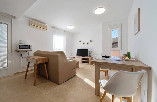 Sant Carles de la Rapita Apartment | Oceanfront Apartment 'La Basseta' with Wi-Fi & Spa