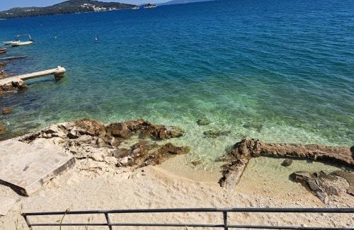 Seget Vranjica Apartment | Oceanfront Retreat: Apartman Monika with Perfect 10/10 Score