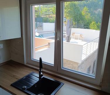 Ruzic Apartment | Ocean View Retreat: Enjoy Pool and Pet Friendly Stays