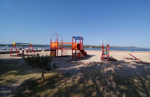 Turanj Apartment | Pet-Friendly Apartman Maris with Oceanfront Views