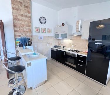 Municipality of Omisalj Apartment | Relaxing Oceanfront Apartment "Sabine" with Heated Pool