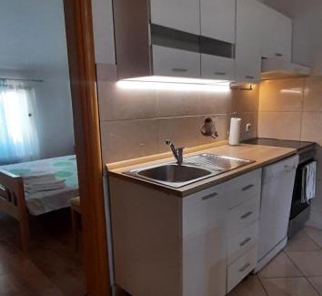 Sveti Filip i Jakov Apartment | Top-Rated Apartman Tina: Family-Friendly with Kitchen Access