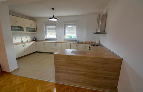 Trn Apartment | Oceanfront Family Retreat at Apartman Vitina - 4 Star Stay