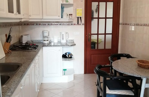 Santa Maria Maior Apartment | Stunning Apartment with Balconies and Scenic City Views