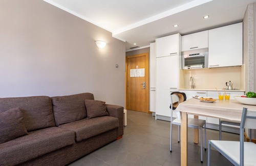 Cangas de Onis Apartment | Cozy Apartment with Balcony, Wi-Fi & Child-Friendly Amenities