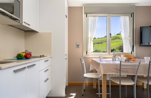 Cangas de Onis Apartment | Cozy 2ºd Apartment with Balcony, Wi-Fi & Spa Amenities