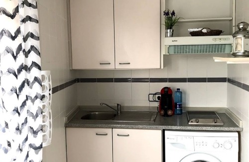 San Anton Apartment | Prime Location: Beachside Apartment with Spa & Family Perks