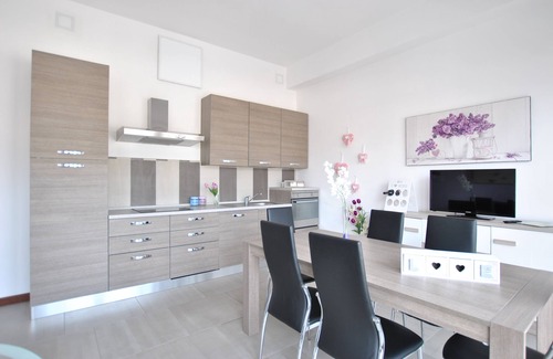 Olbia Apartment | Relaxing Apartment A with Spa, Kitchen & Family-Friendly Perks