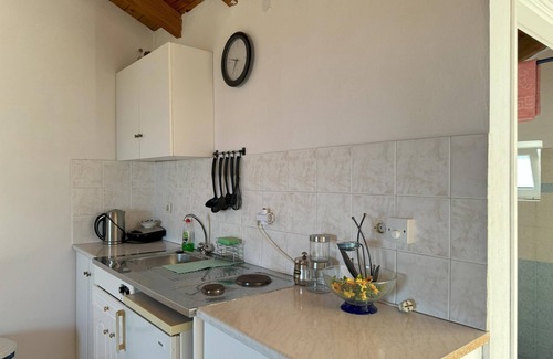 Kompi Apartment | Seaside Retreat: Apartment Steps from Peroulia Beach