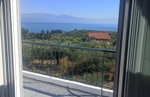 Kompi Apartment | Seaside Retreat: Apartment Steps from Peroulia Beach