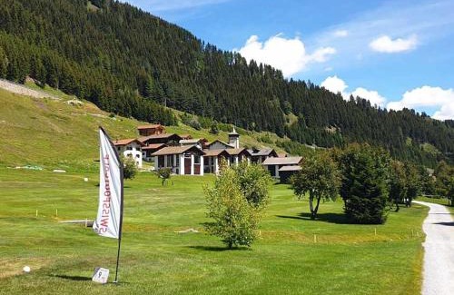 Tschamut Apartment | Cozy Apartment Casa Alpetta - Family-Friendly Retreat